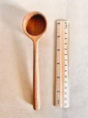 teak teaspoon scoops: natural wooden scoops for children’s activities.