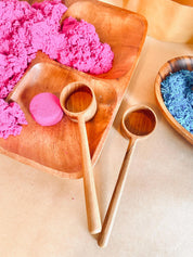 teak teaspoon scoops: natural wooden scoops for children’s activities.