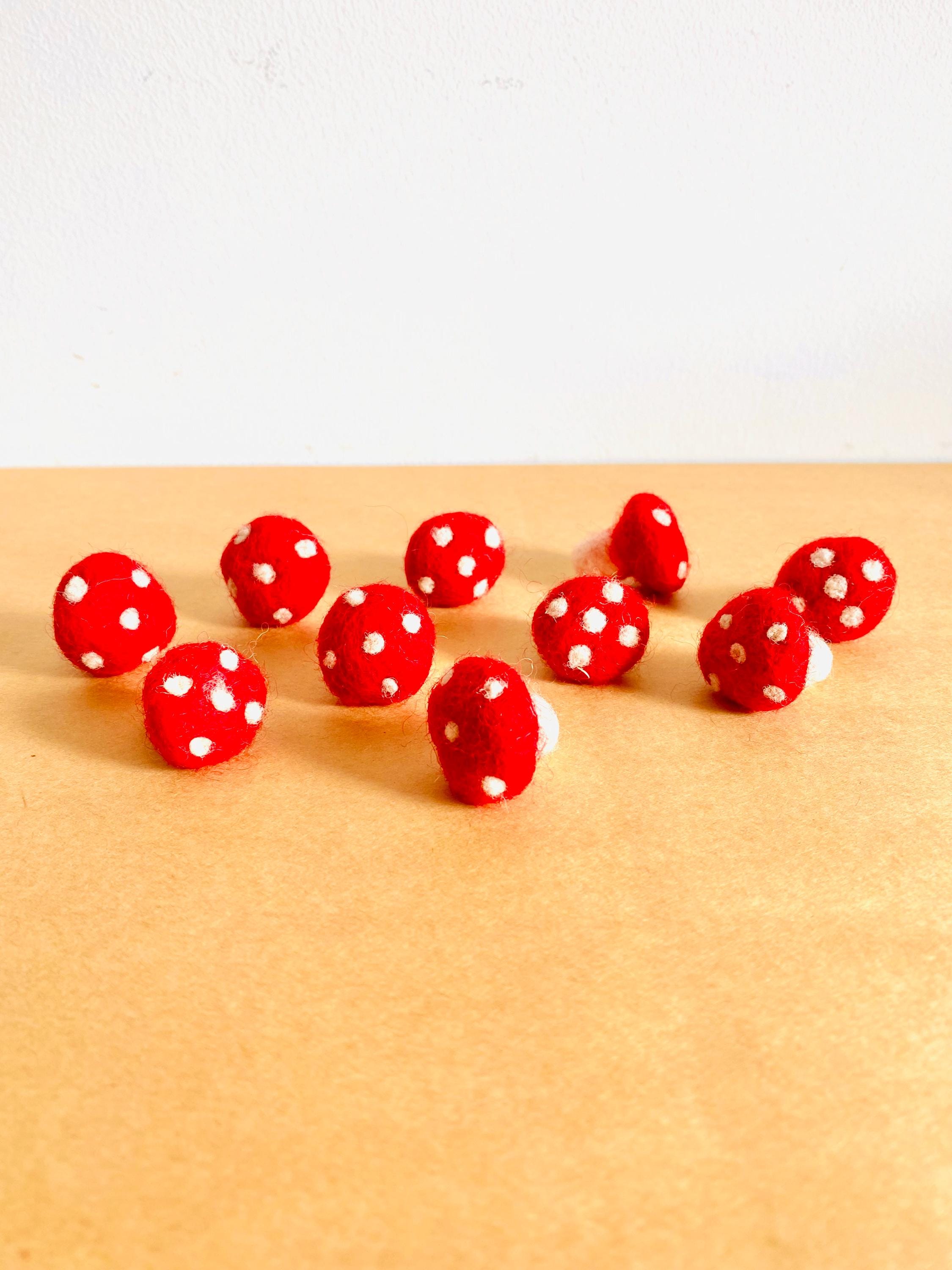 Felt Mushrooms: Red and white felt mushrooms for fairy garden play.