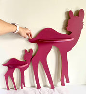 Burgundy wooden deer shelf with hooks, ideal for kids' rooms or adding rustic charm to any space. Customizable options available.