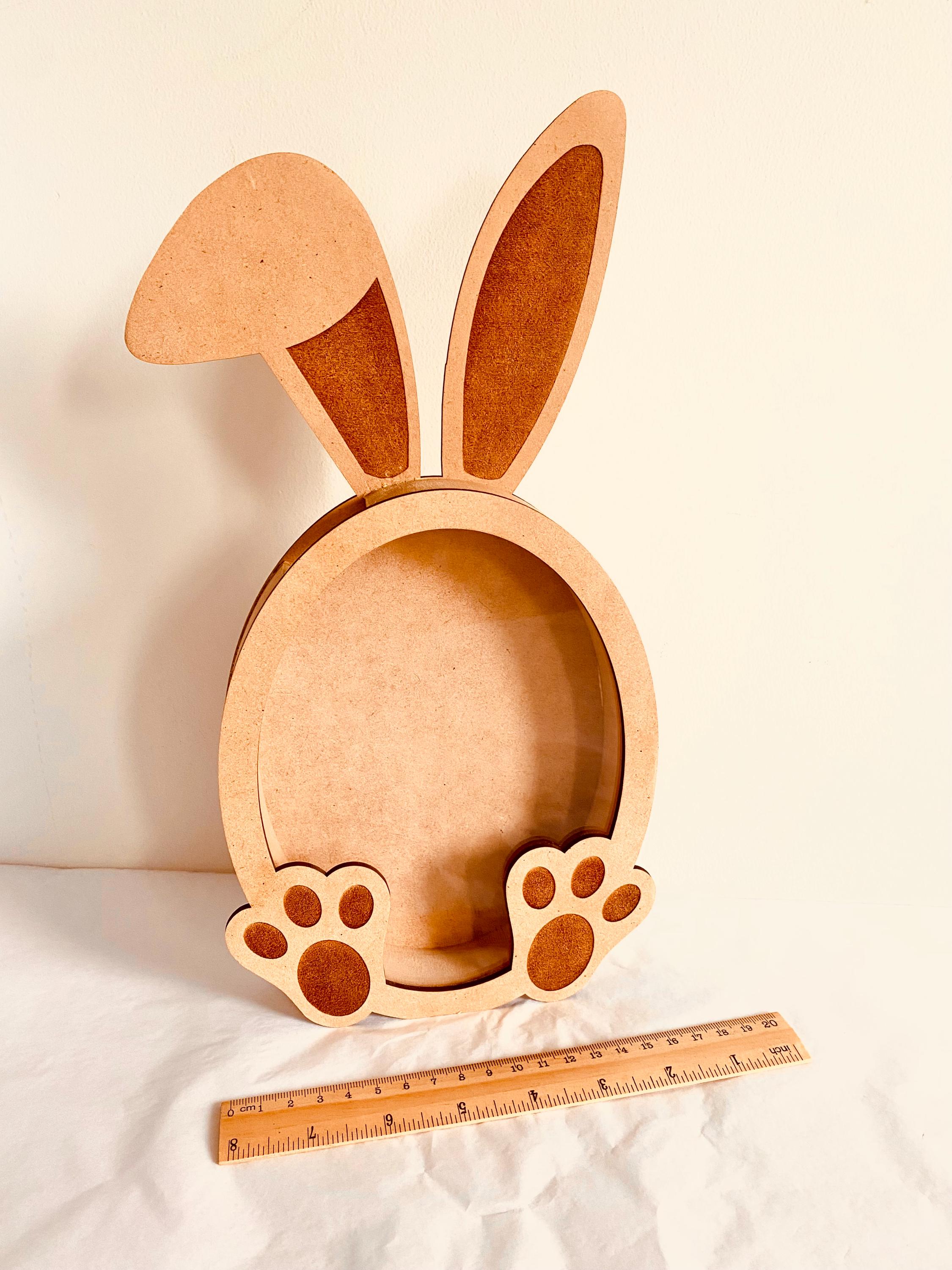 Bunny Rabbit Easter Egg Drops Piggy Bank: Rabbit-themed money box perfect for Easter gifts.