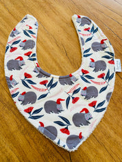 Christmas WOMBAT Bib: Baby bib with a festive wombat design.
