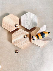 Hand-painted bee set, available in 4, 5, or 9 pieces. Perfect for creative play, crafts, or unique decor.