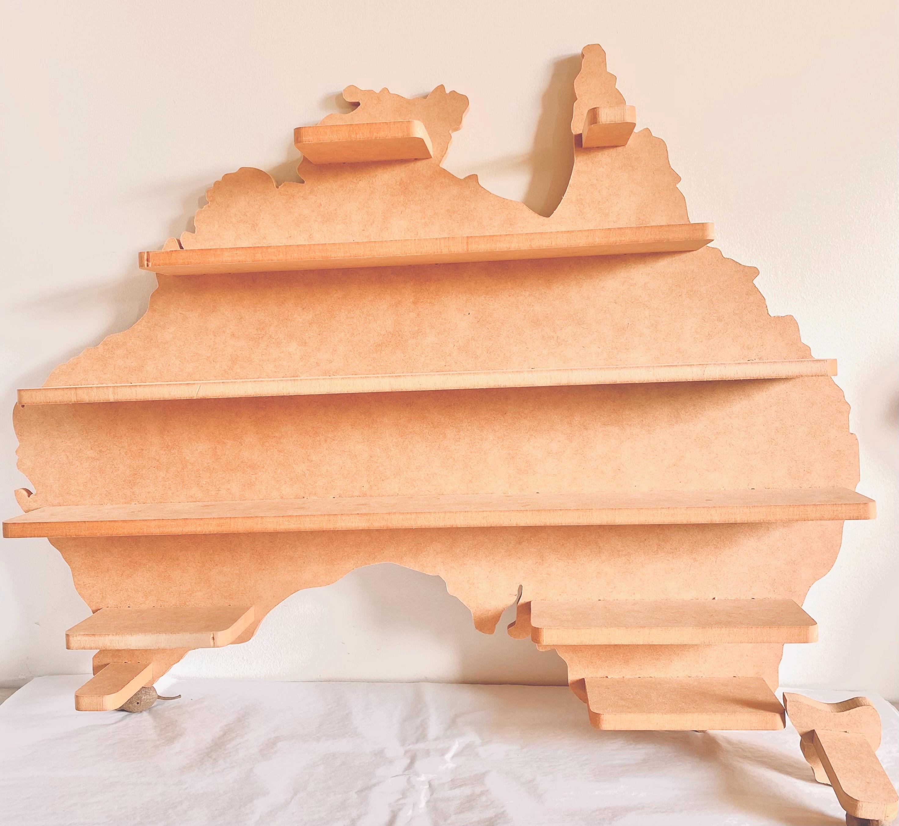 Natural Australian-shaped wall shelf, a stunning and functional home decor piece.