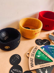 Indigenous nested bowl set in Australian flag colors, adorned with cultural symbols for NAIDOC Week.