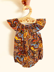 Indigenous Cotton Flutter Playsuit: Handmade Jijaka indigenous cotton flutter playsuit featuring an Australian-inspired design.