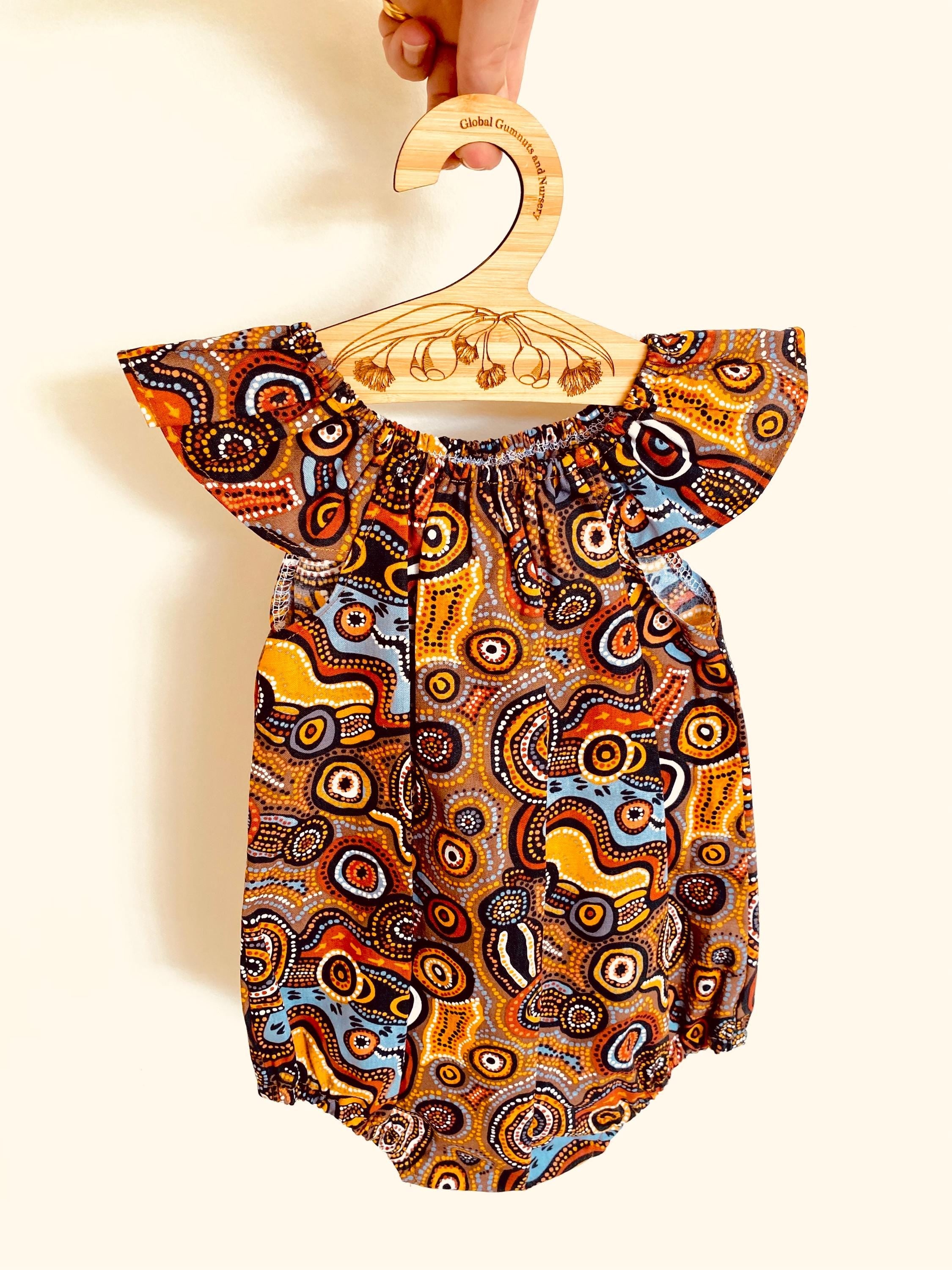 Indigenous Cotton Flutter Playsuit: Handmade Jijaka indigenous cotton flutter playsuit featuring an Australian-inspired design.