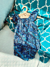 Handmade Desert Tracks Playsuit: Indigenous-inspired cotton playsuit with desert tracks pattern, handmade in Western Australia.
