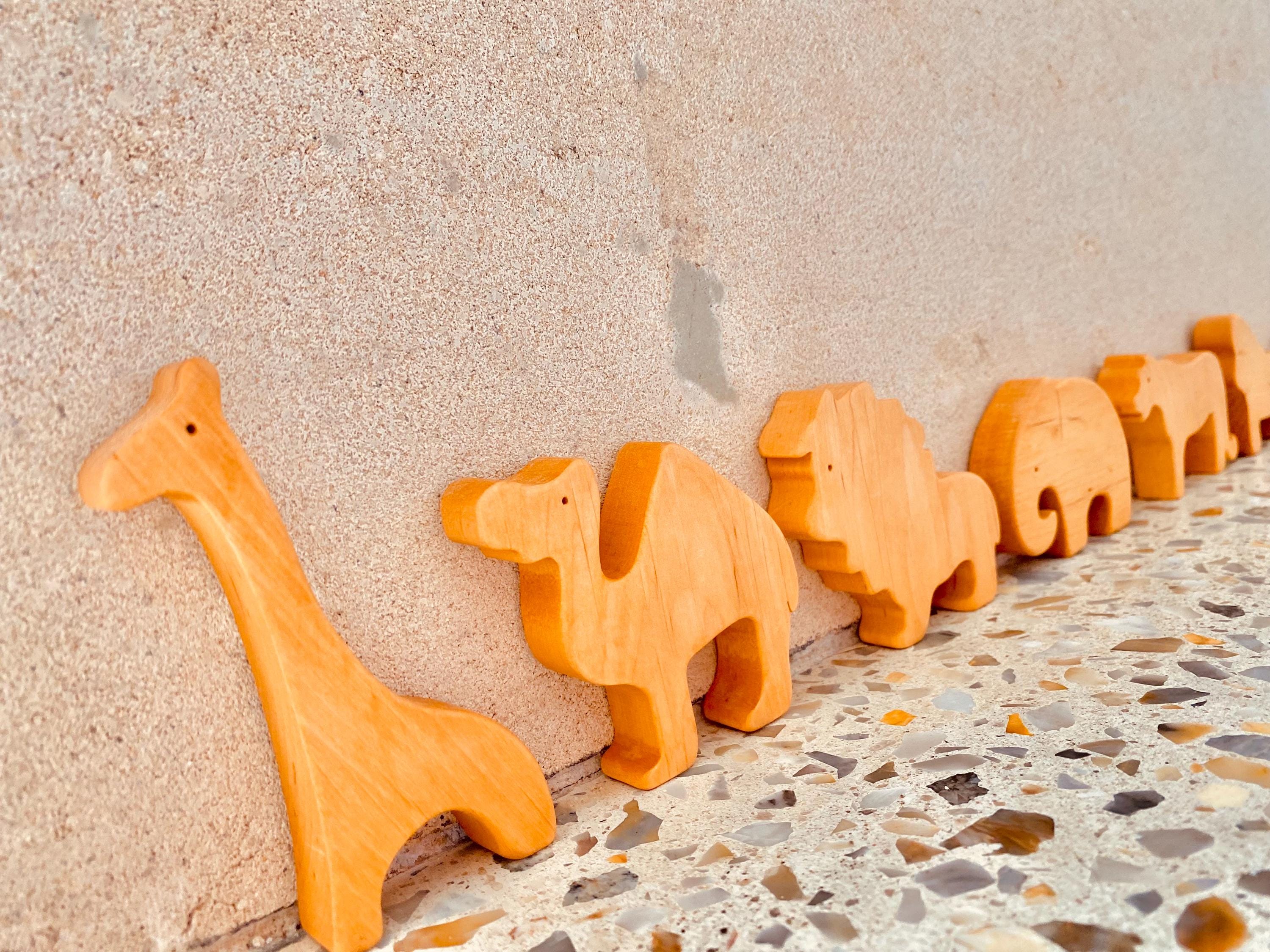 African Wooden Animal Set: 10-piece wooden animal set featuring African wildlife.