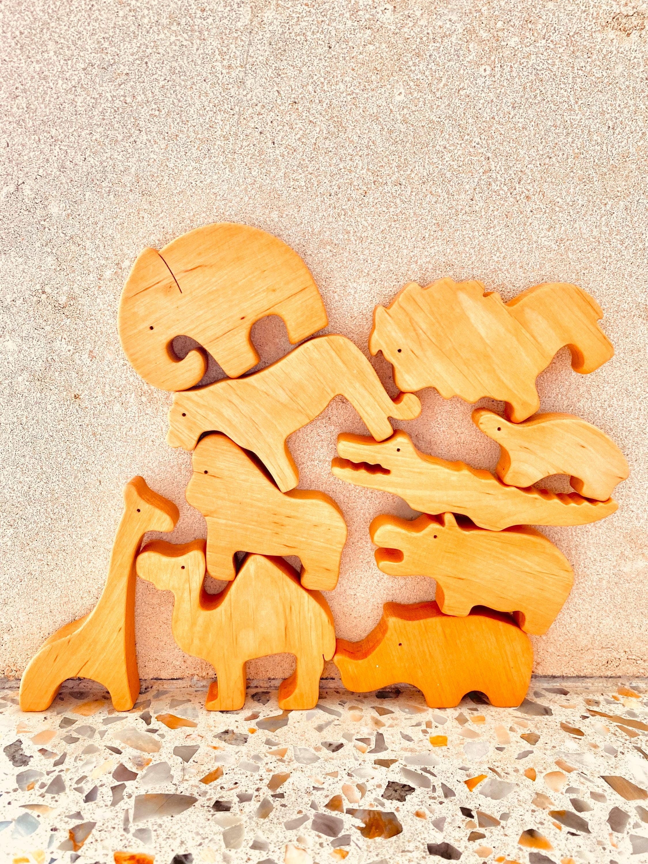 African Wooden Animal Set: 10-piece wooden animal set featuring African wildlife.