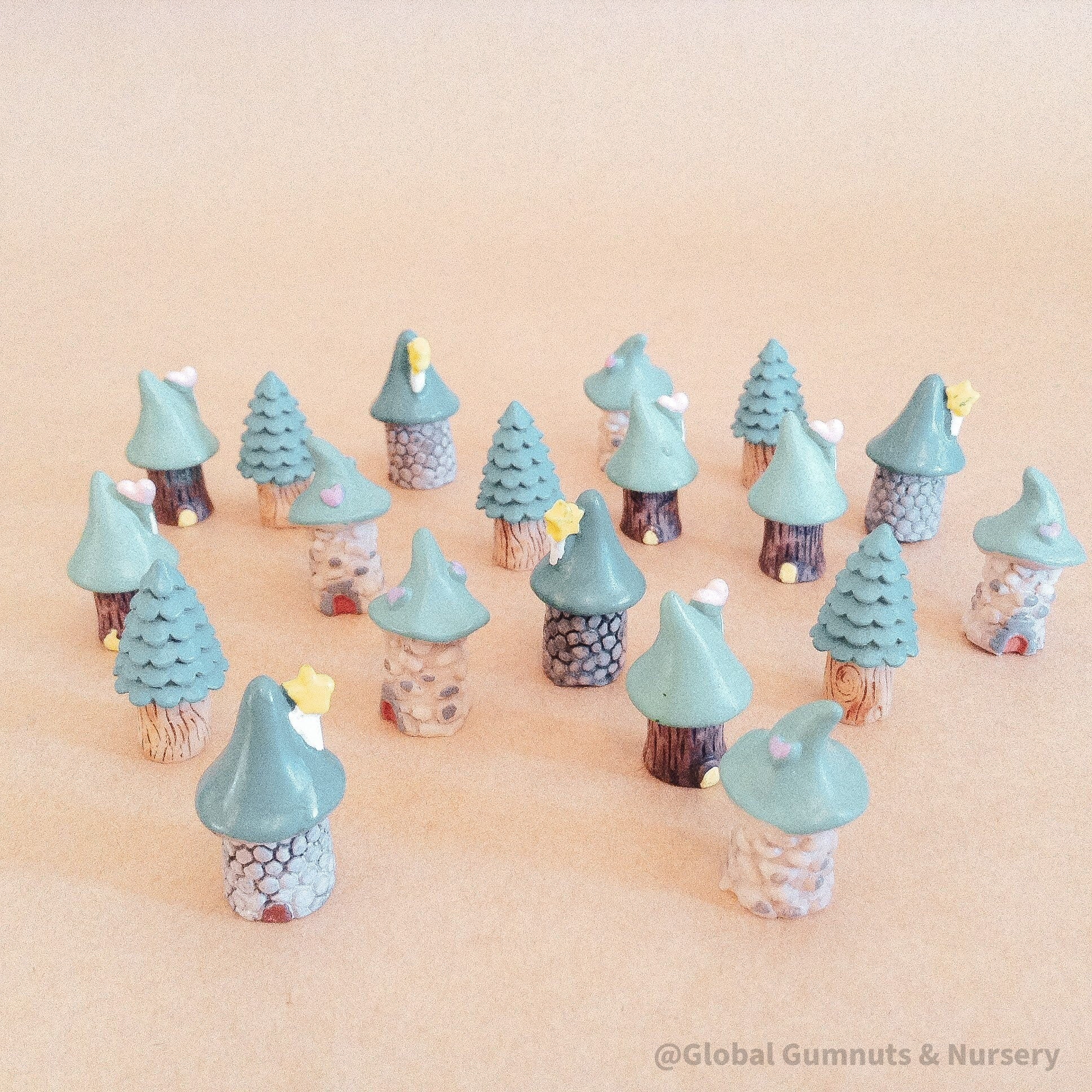 mini green tree fairy house figurines: whimsical resin treehouse figures for fairy gardens.