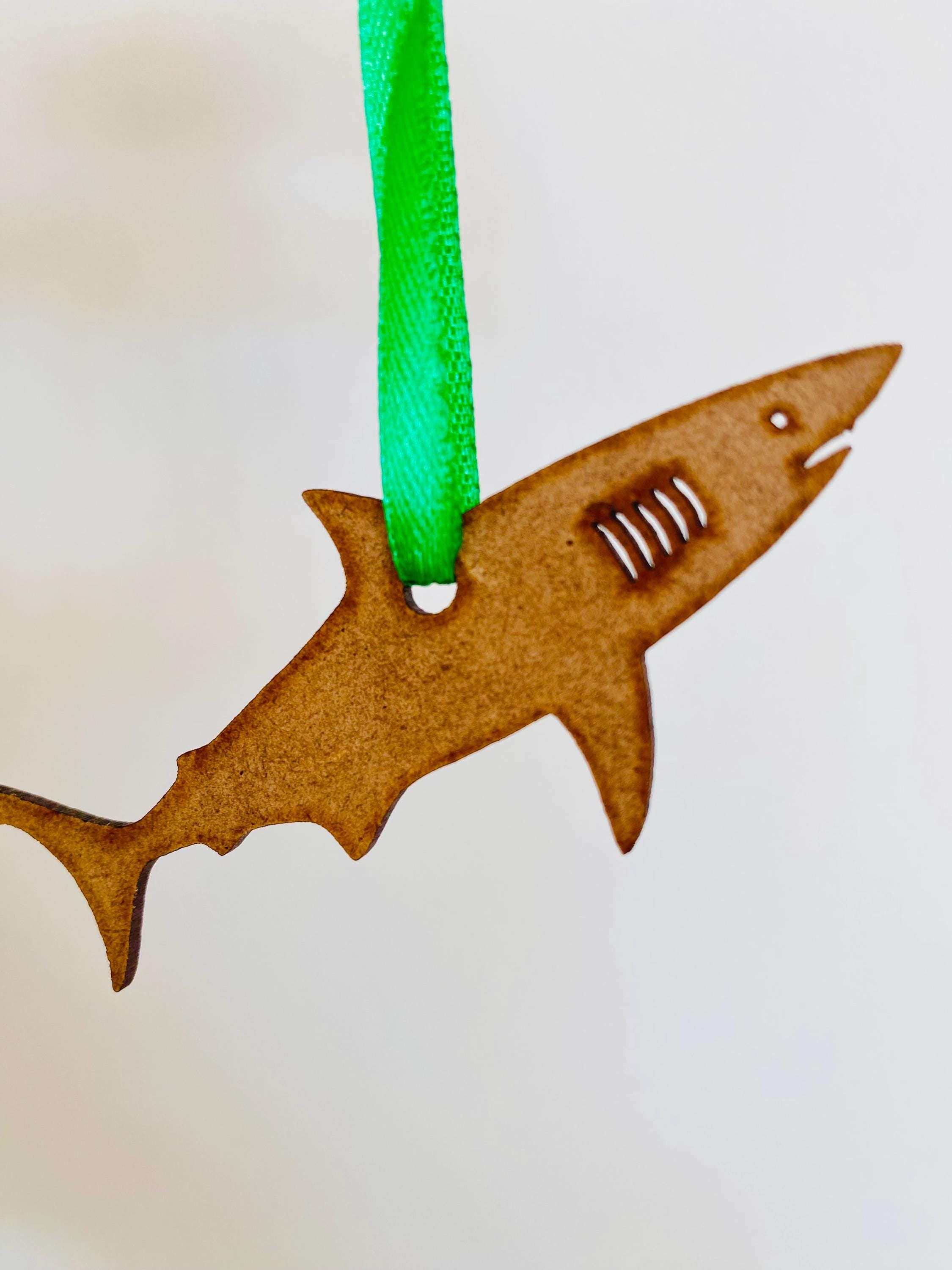 Shark Ornament: Wooden shark ornament for Australian-themed Christmas decor.