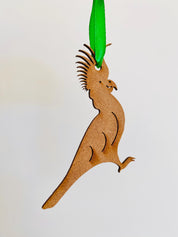 Cockatoo Ornament: Wooden ornament of a cockatoo for Christmas decorations.