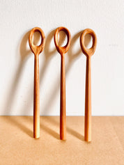 teak bubble wand: wooden wand for bubbles or stirring activities.
