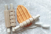 Set of 3 Patterned Rolling Pins: Wooden rolling pins with various patterns for creative play.