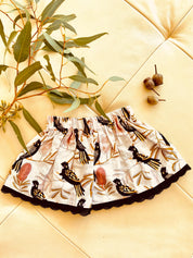 Black Cockatoo Skirt: Australian-themed cotton skirt with a black cockatoo pattern, handmade with a touch of charm.