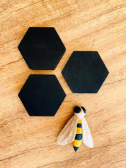 Hand-painted bee set, available in 4, 5, or 9 pieces. Perfect for creative play, crafts, or unique decor.