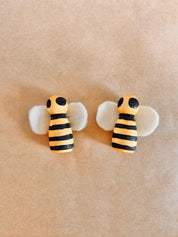 Handcrafted wooden bees with felt wings (3cm), a limited-edition piece for whimsical decor or creative play.