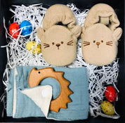 Meet your spiky sidekick: a cozy echidna plush with a blanket for snuggly moments.