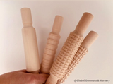 Rodillo de madera natural con dibujos y lisos