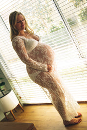 White stunning maternity lace dress, perfect for photoshoot style.