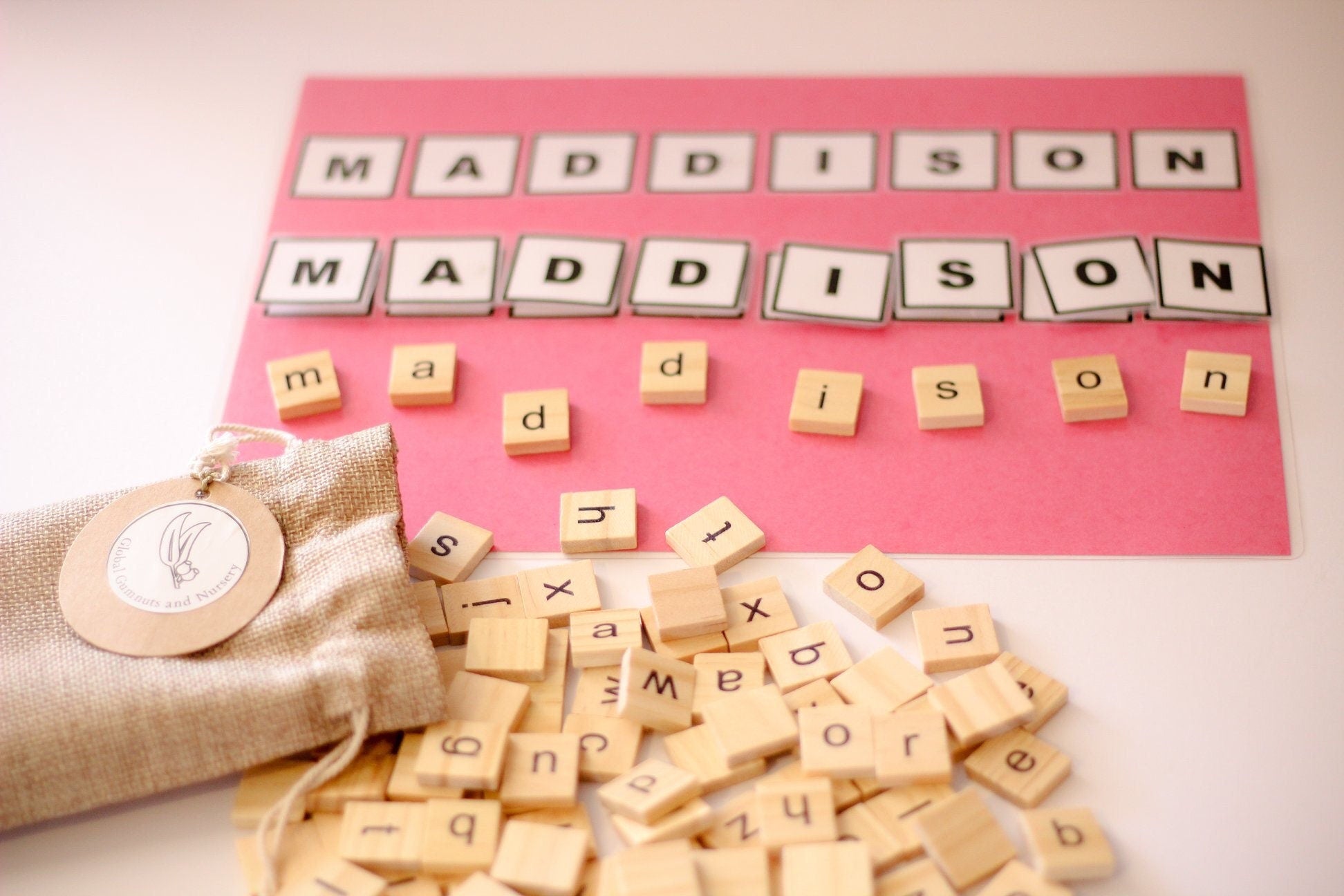 100 Lowercase Tiles: Wooden lowercase letter tiles for learning and activities.