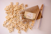 100 Lowercase Tiles: Wooden lowercase letter tiles for learning and activities.