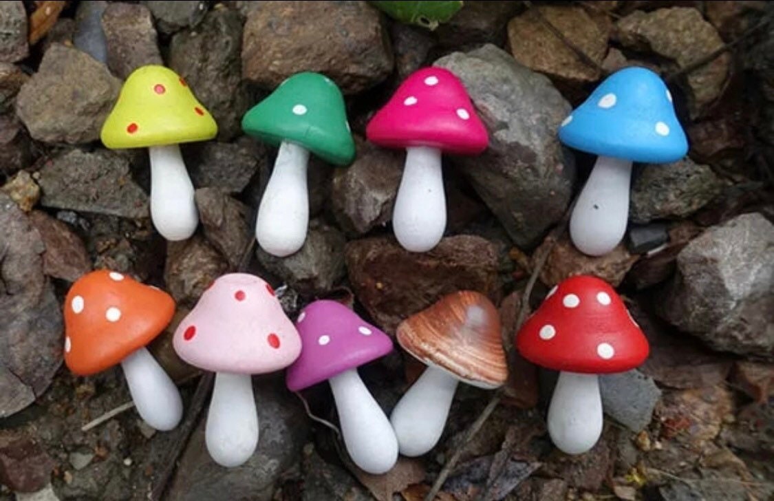 Large wooden mushrooms, ideal for fairy gardens, whimsical decor, or Christmas elf setups.