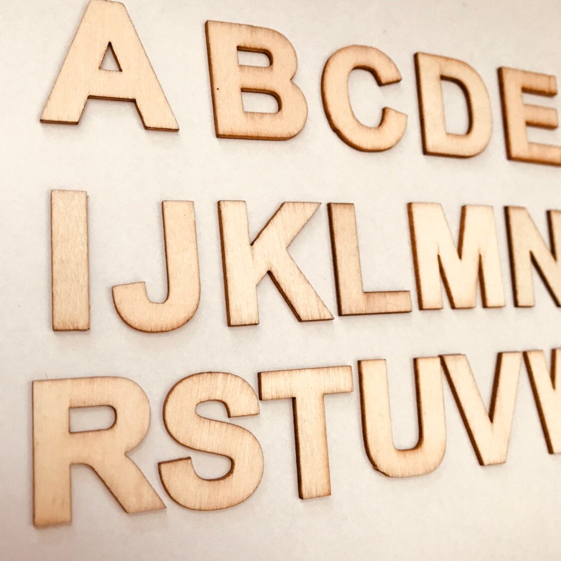 A-Z Wooden Alphabet Set: 26-piece wooden alphabet set for literacy and crafts.