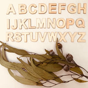 A-Z Wooden Alphabet Set: 26-piece wooden alphabet set for literacy and crafts.