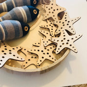 Starfish wooden sets, a beach-themed addition to decor or play.