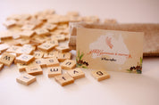 100 Lowercase Tiles: Wooden lowercase letter tiles for learning and activities.