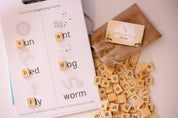 100 Lowercase Tiles: Wooden lowercase letter tiles for learning and activities.