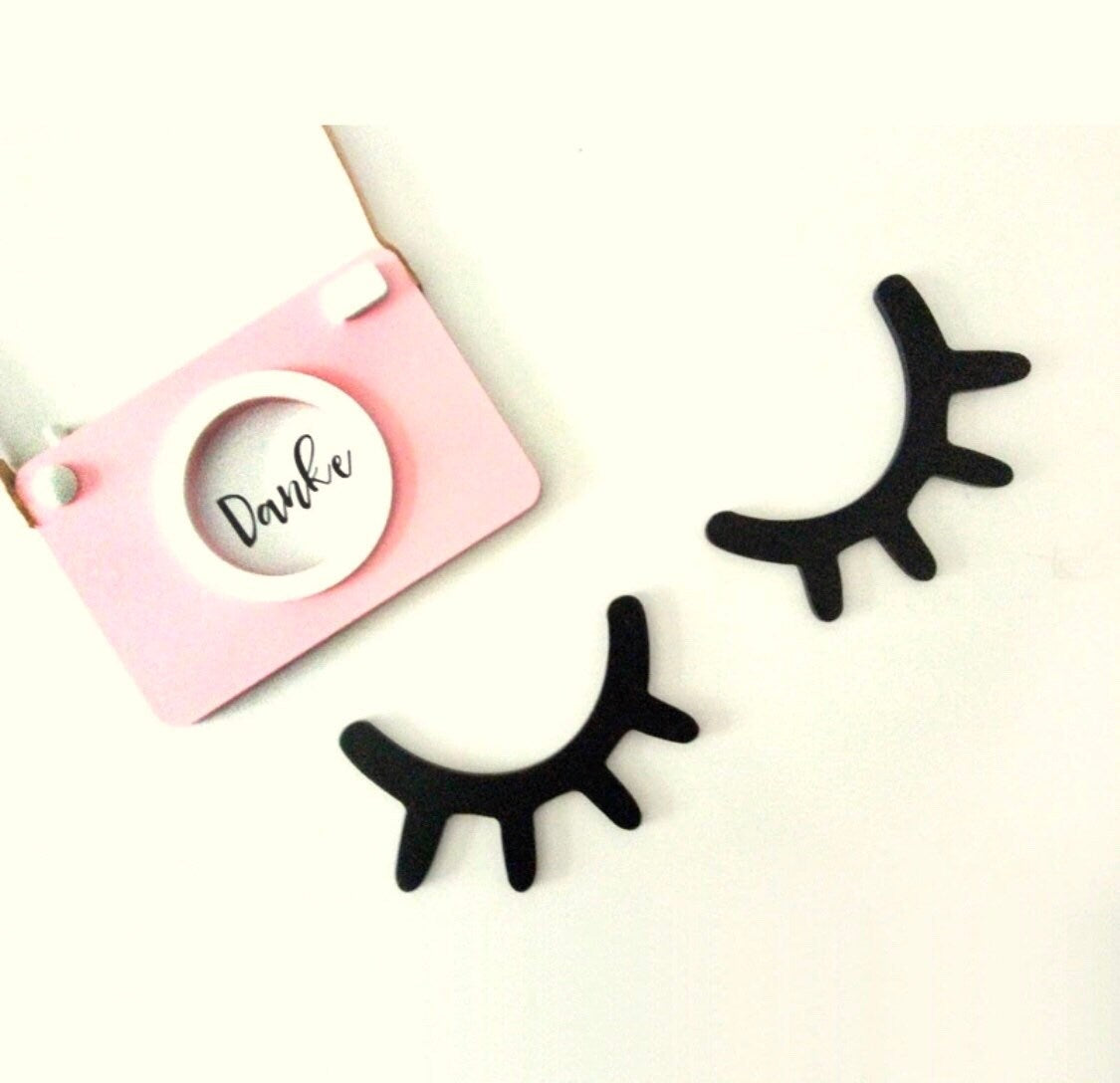 Sleepy eyes decor, a whimsical touch for nursery or kids' rooms.