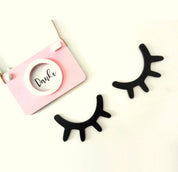 Sleepy eyes decor, a whimsical touch for nursery or kids' rooms.