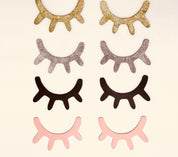 Sleepy eyes decor, a whimsical touch for nursery or kids' rooms.