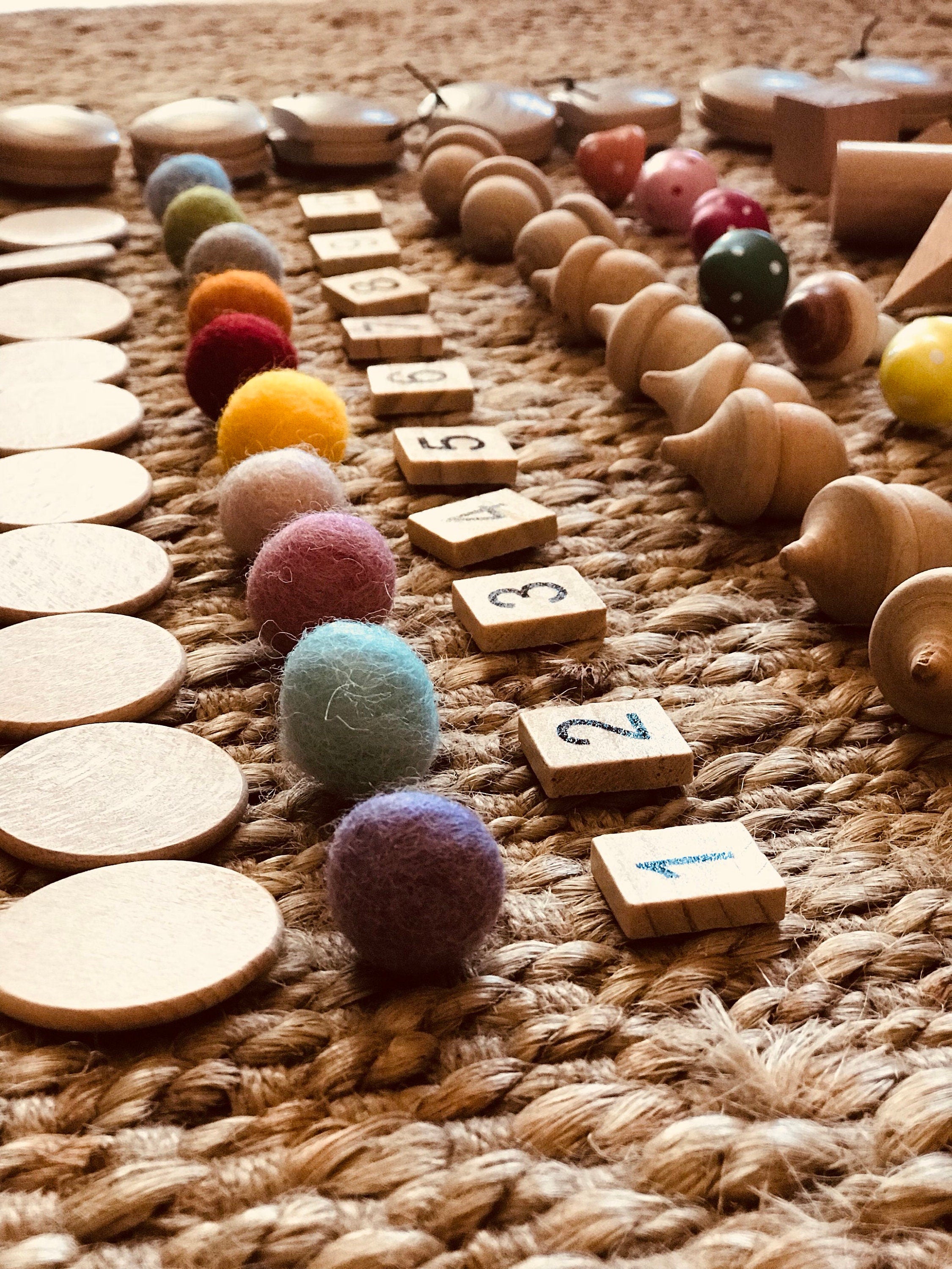 1-10 Wooden Number Tiles: Wooden tiles for number recognition and counting practice.