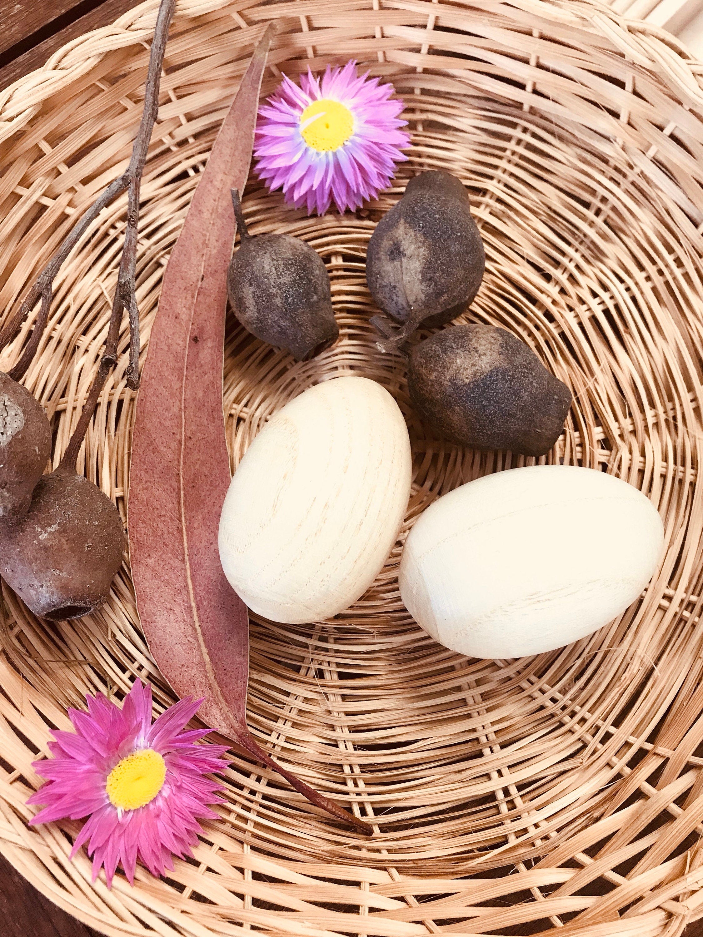 Wooden egg shakers, available individually or as a set of 2, perfect for Easter or musical fun.
