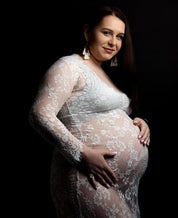 White stunning maternity lace dress, perfect for photoshoot style.