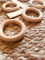 Wooden Rings 70mm: Versatile wooden rings for craft and educational use.