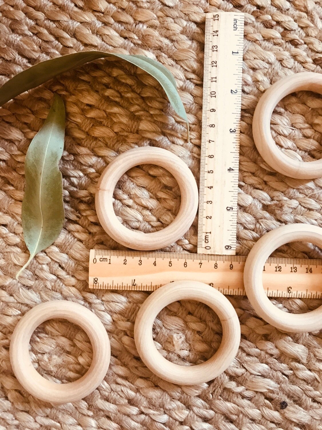 Wooden Rings 70mm: Versatile wooden rings for craft and educational use.