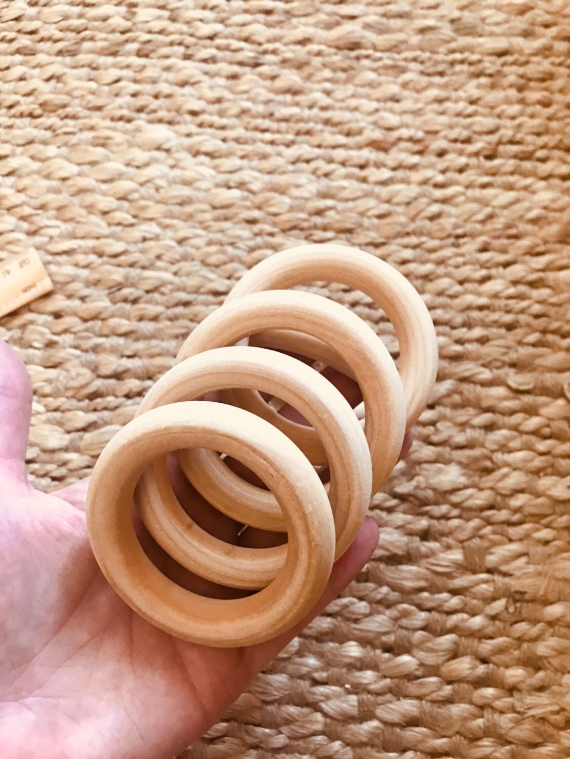 Wooden Rings 70mm: Versatile wooden rings for craft and educational use.