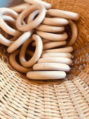 Wooden Rings 70mm: Versatile wooden rings for craft and educational use.