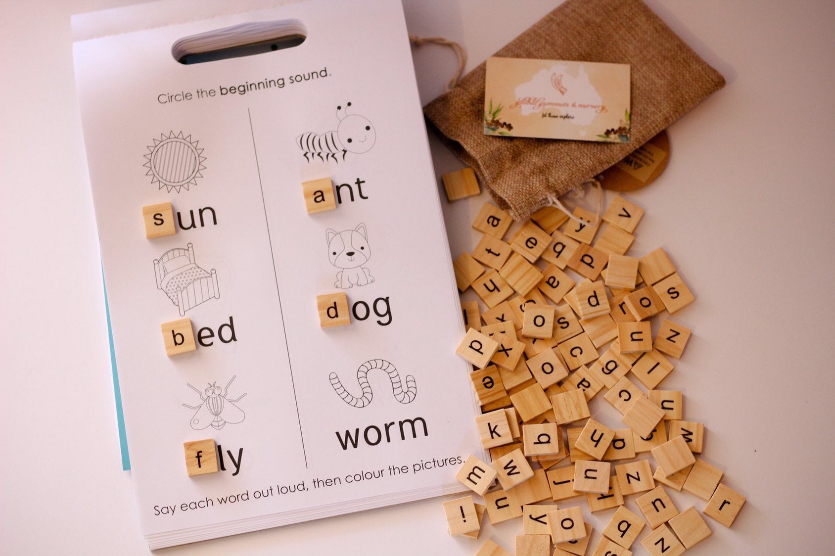 100 Lowercase Tiles: Wooden lowercase letter tiles for learning and activities.