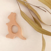 Wooden kangaroo, crafted from natural beech wood for play gyms or pocket gifts.
