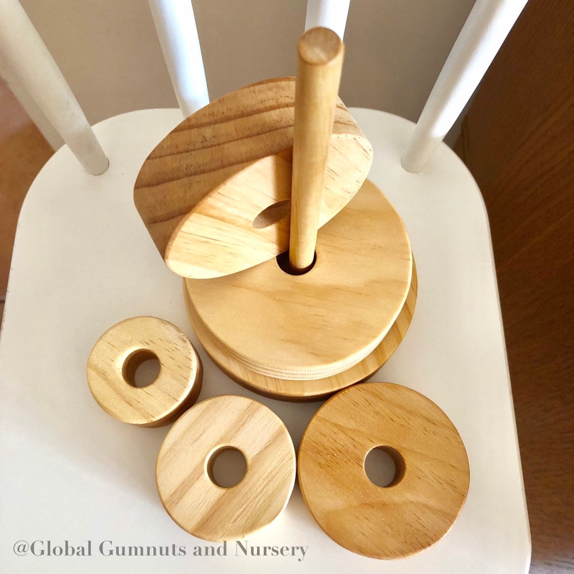 Natural Wooden Stacker: Customizable stacker with a personalized name option.