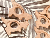 Wooden kangaroo, crafted from natural beech wood for play gyms or pocket gifts.
