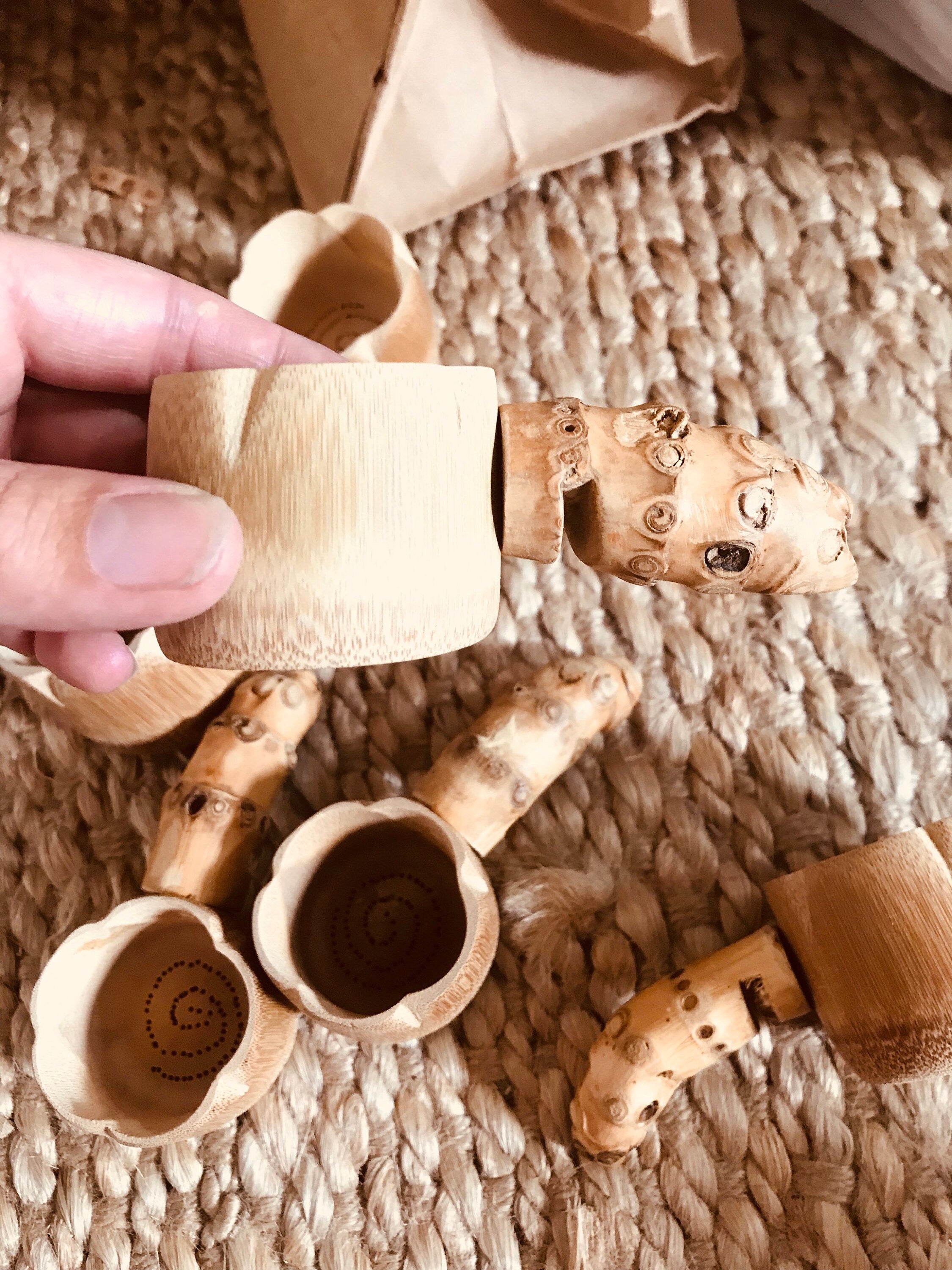 Water play scoop with holes in a bucket, perfect for sensory or outdoor play.