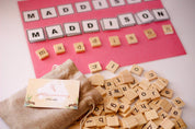 100 Lowercase Tiles: Wooden lowercase letter tiles for learning and activities.