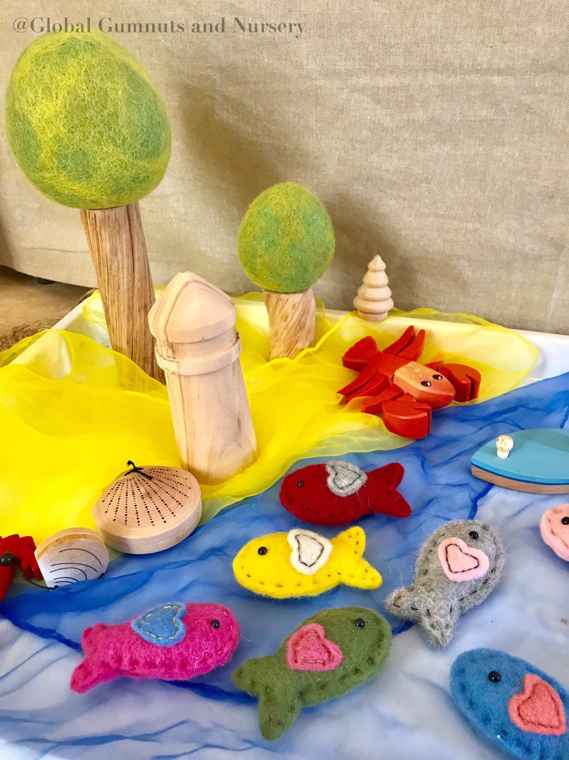 Wool and felt fish, a soft and playful crafting or learning resource.